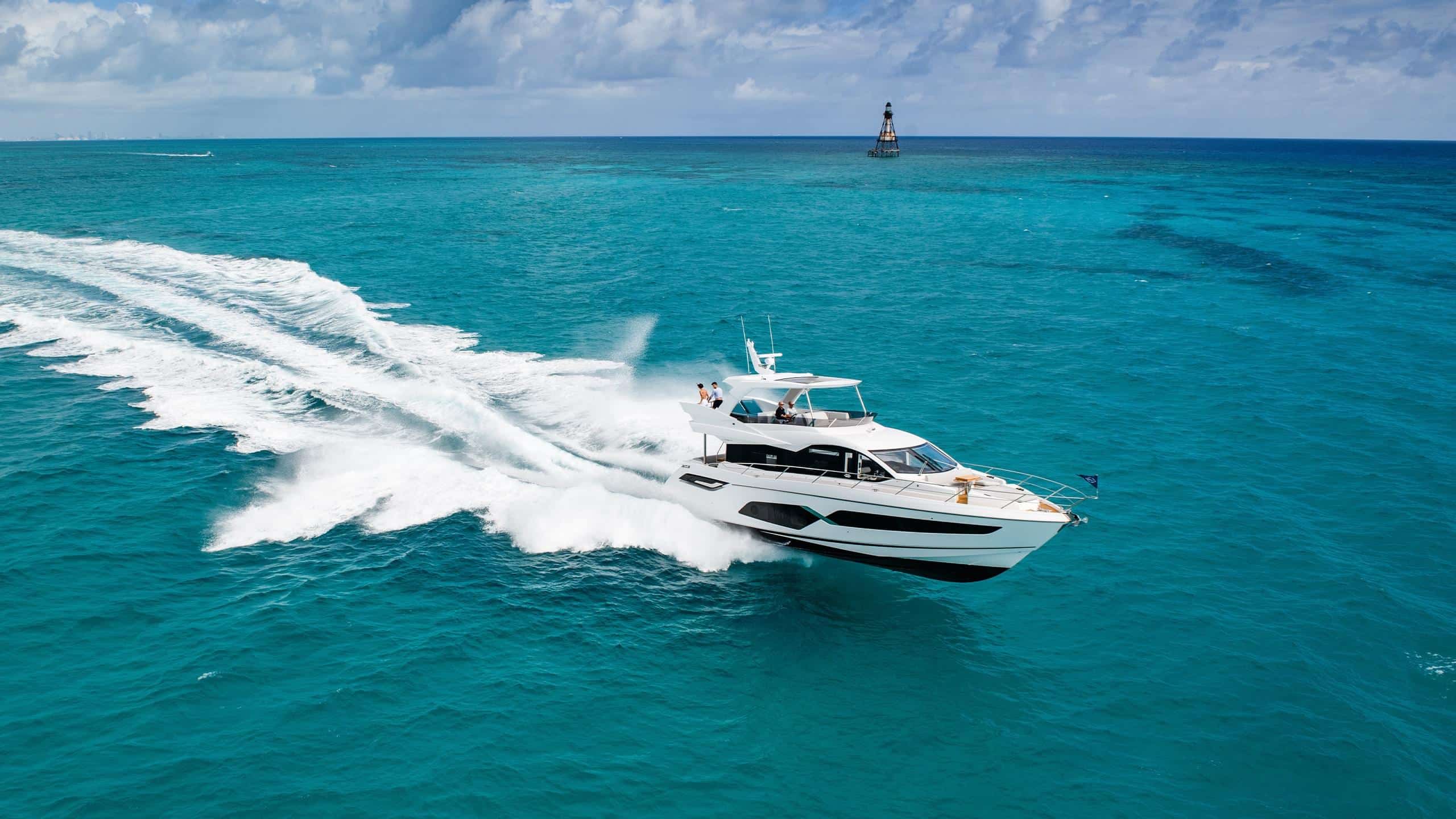 Sunseeker Manhattan 68 aerial profile running at speed — shipyard photo