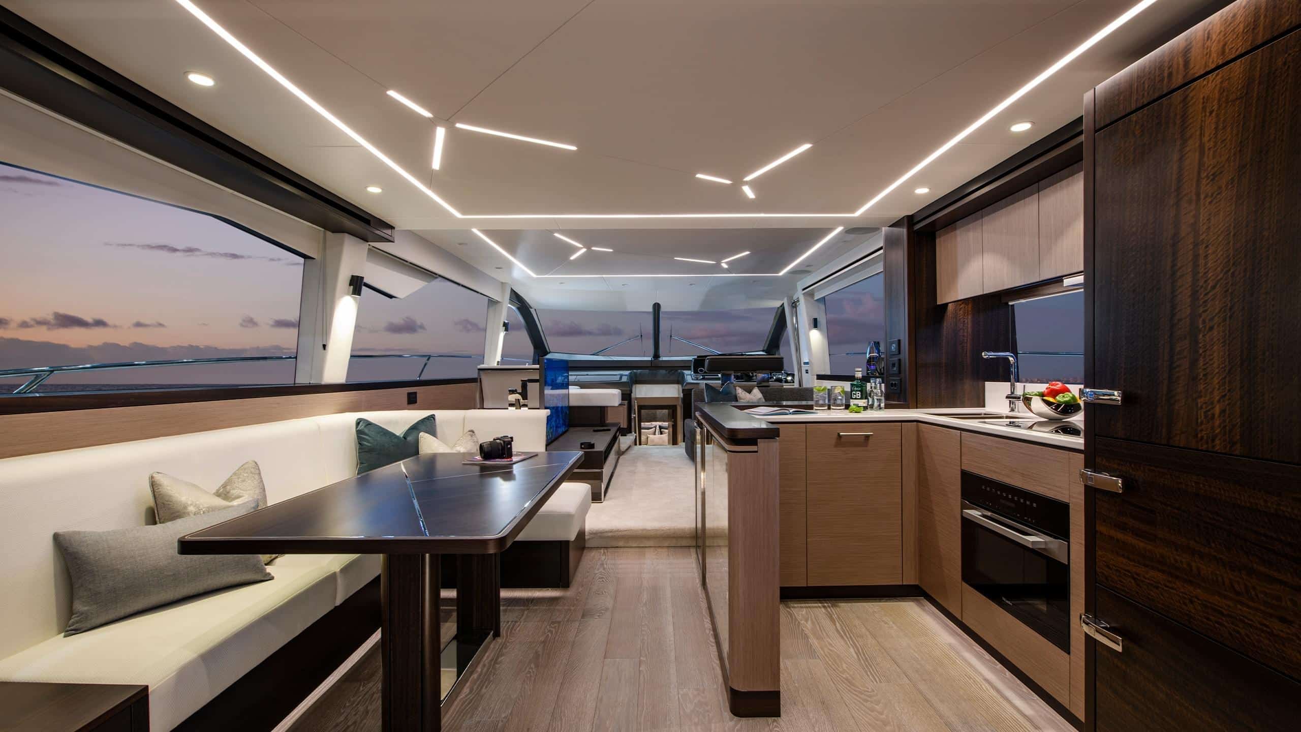Sunseeker Manhattan 68 main saloon with aft galley — shipyard photo