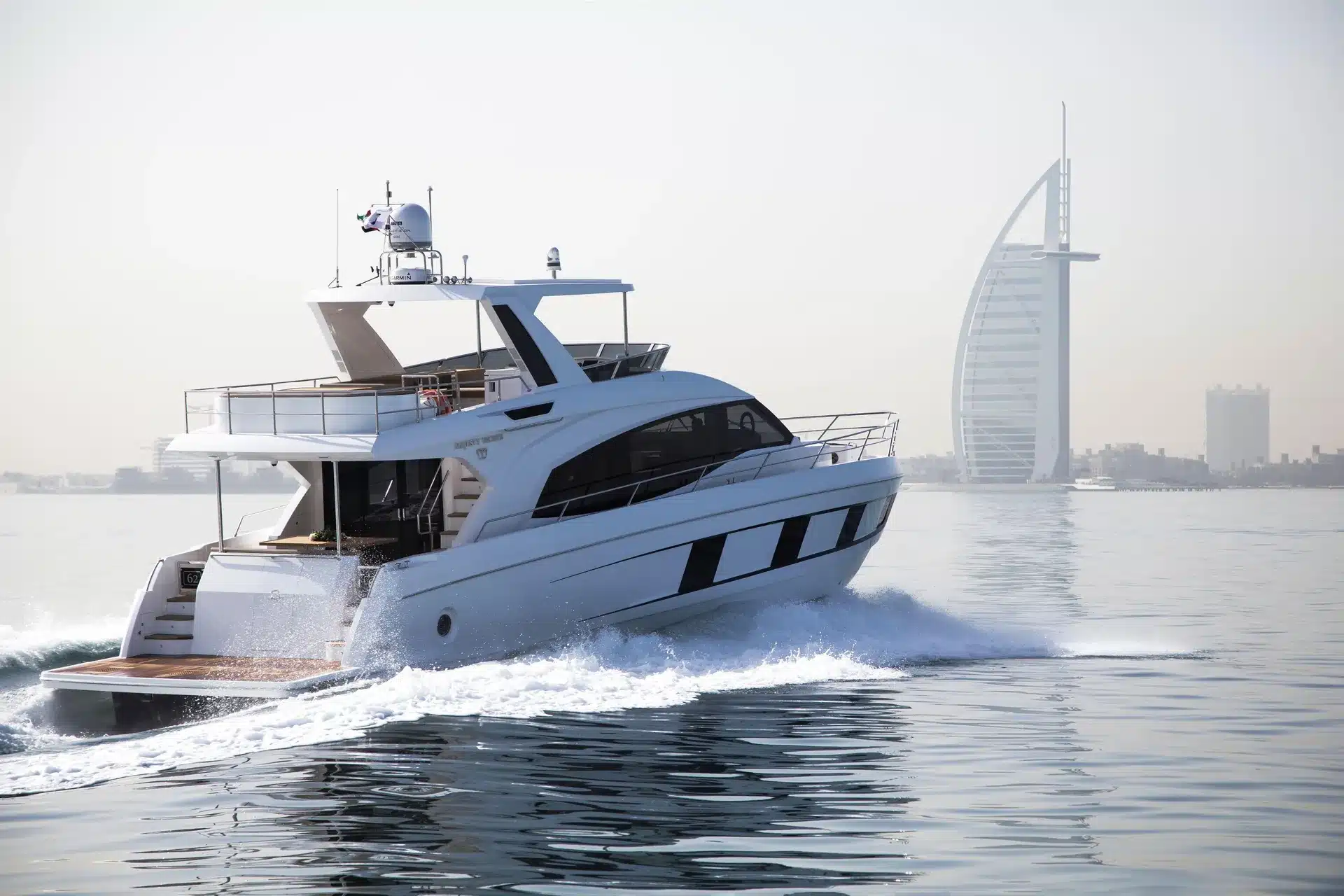 Alia 62 cruising near Burj Al Arab – aft quarter view