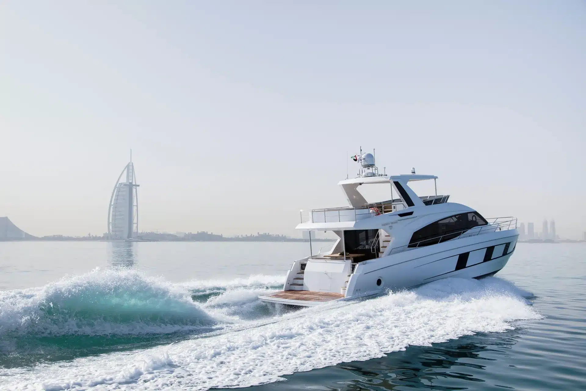 Alia 62 at speed with Burj Al Arab in the background