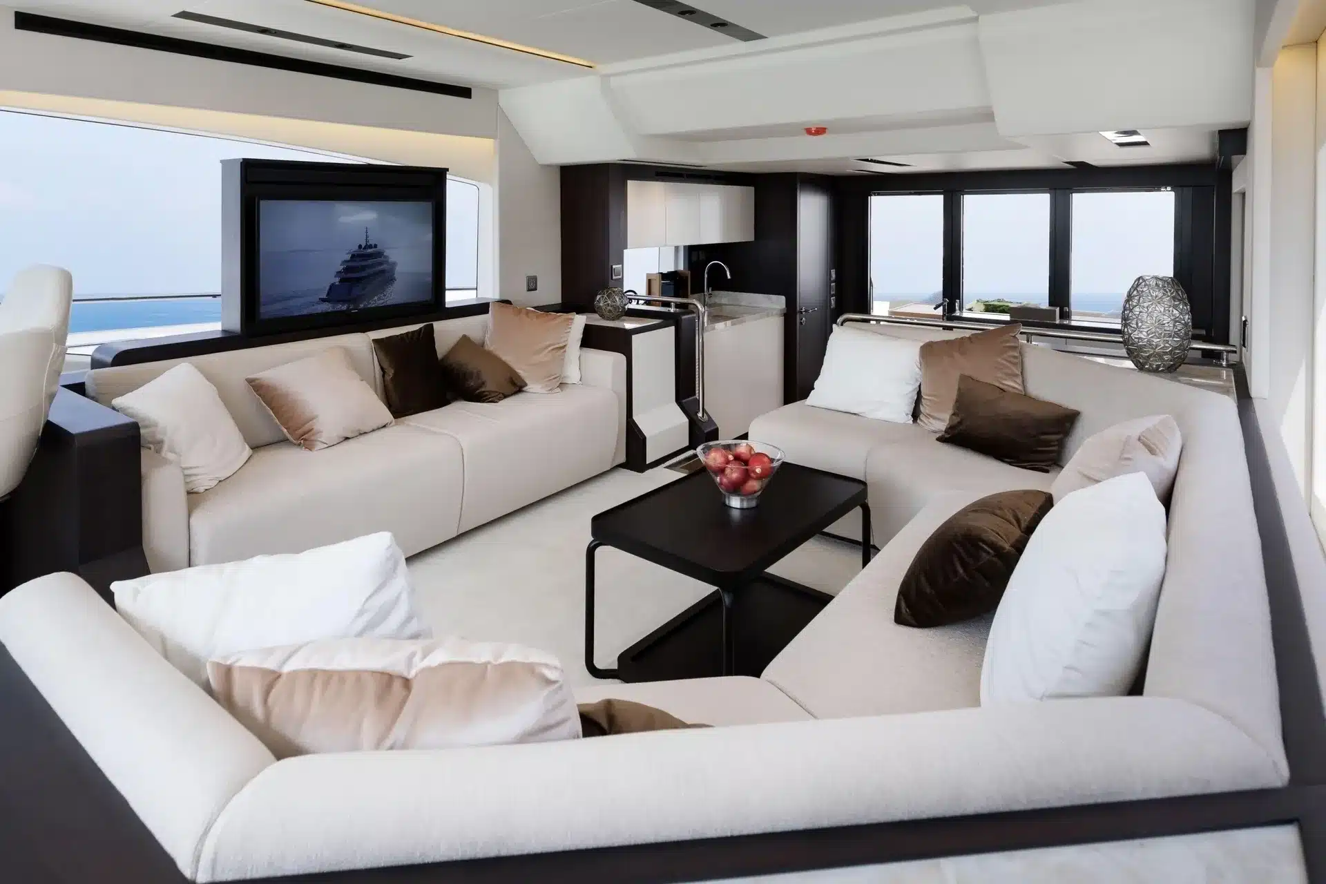 Alia 62 main saloon with lounge seating and TV